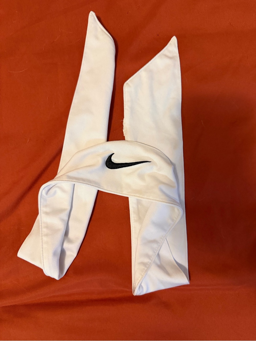 Nike White Headband with Black Swoosh